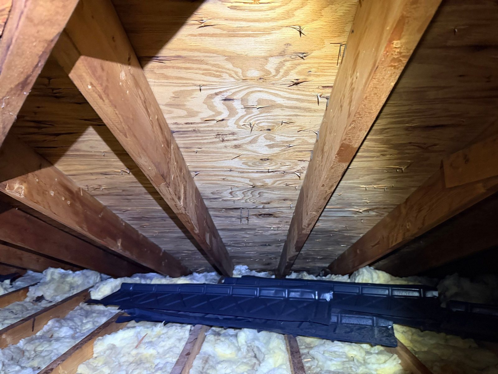 Attic plywood sheathing and ventilation baffles